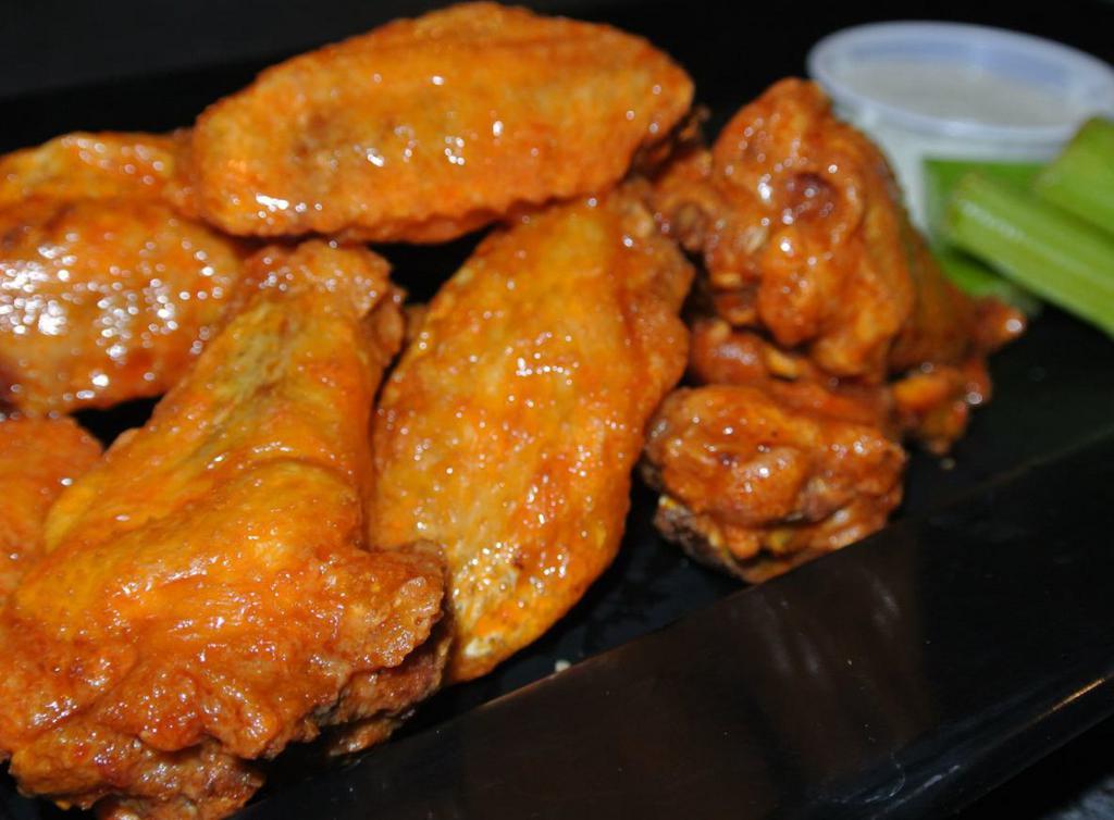 Chicken Wings · Traditional or boneless. Buffalo hot, BBQ, garlic Parmesan. Served with celery and ranch dipping sauce. Extra ranch for an additional charge.