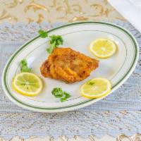 11. Fried Fish · 1 lb. Fresh fish marinated and fried in a combination of spices.
