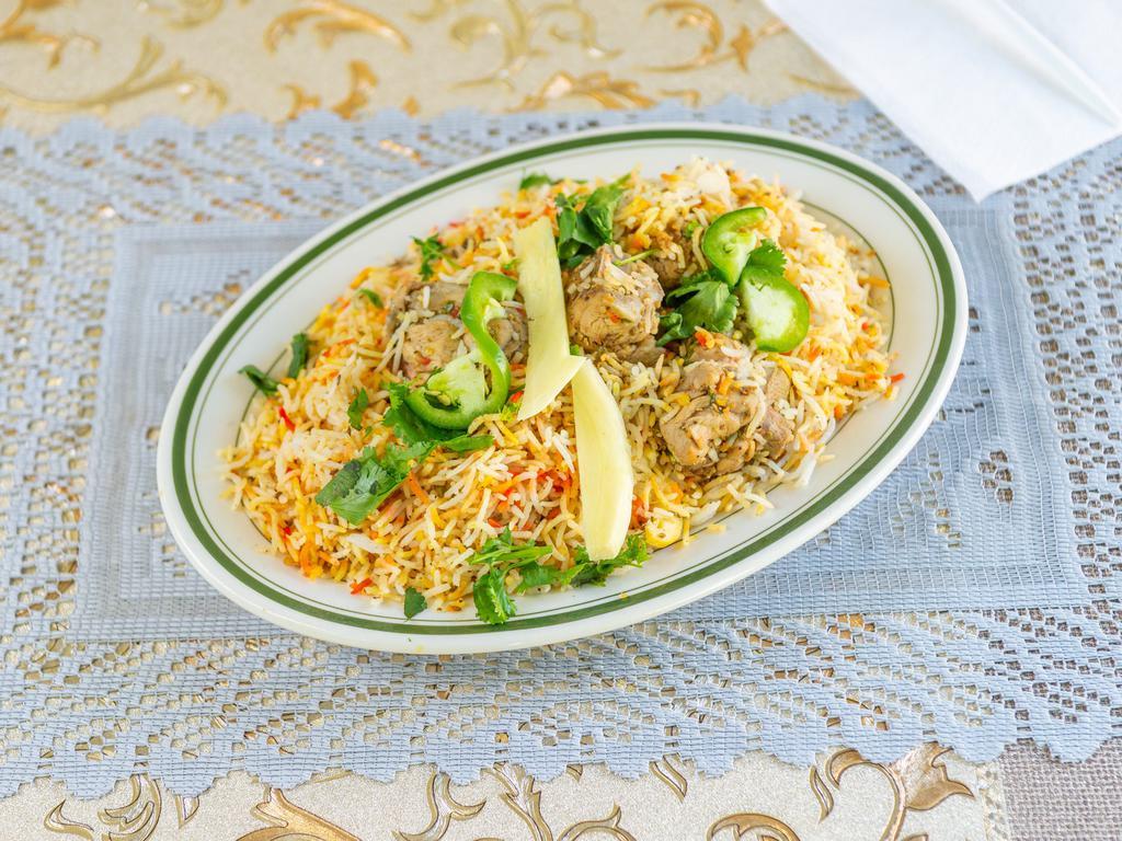 41. Chicken Biryani · Selected portions of royal chicken cooked in herbs and spices with fragrant rice and nuts.