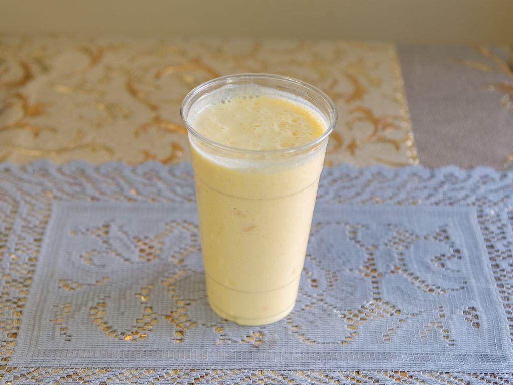 67. Mango Lassi · Fresh yogurt blended with mango and served chilled.