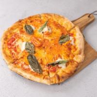 Margherita Pizza · Gustosel mozzarella di bufala, tomatoes, grana and basil.