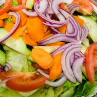 S8. House Salad · Iceberg lettuce, tomato, cucumbers, red onion and carrots, with oil and vinegar.