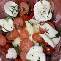 AP16. Cold Antipasto for 2 · Imported meats and cheeses with olives.