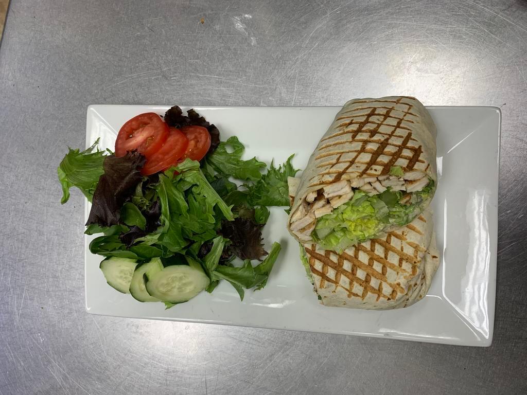 W7. Grilled Chicken with Avocado Wrap · Served with lettuce and tomato.