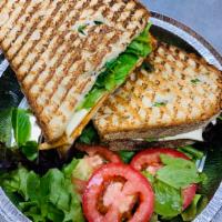 PS5. Domenica Panini · Thin sliced grilled chicken, roasted peppers, burrata cheese, baby spinach, red onion, extra...