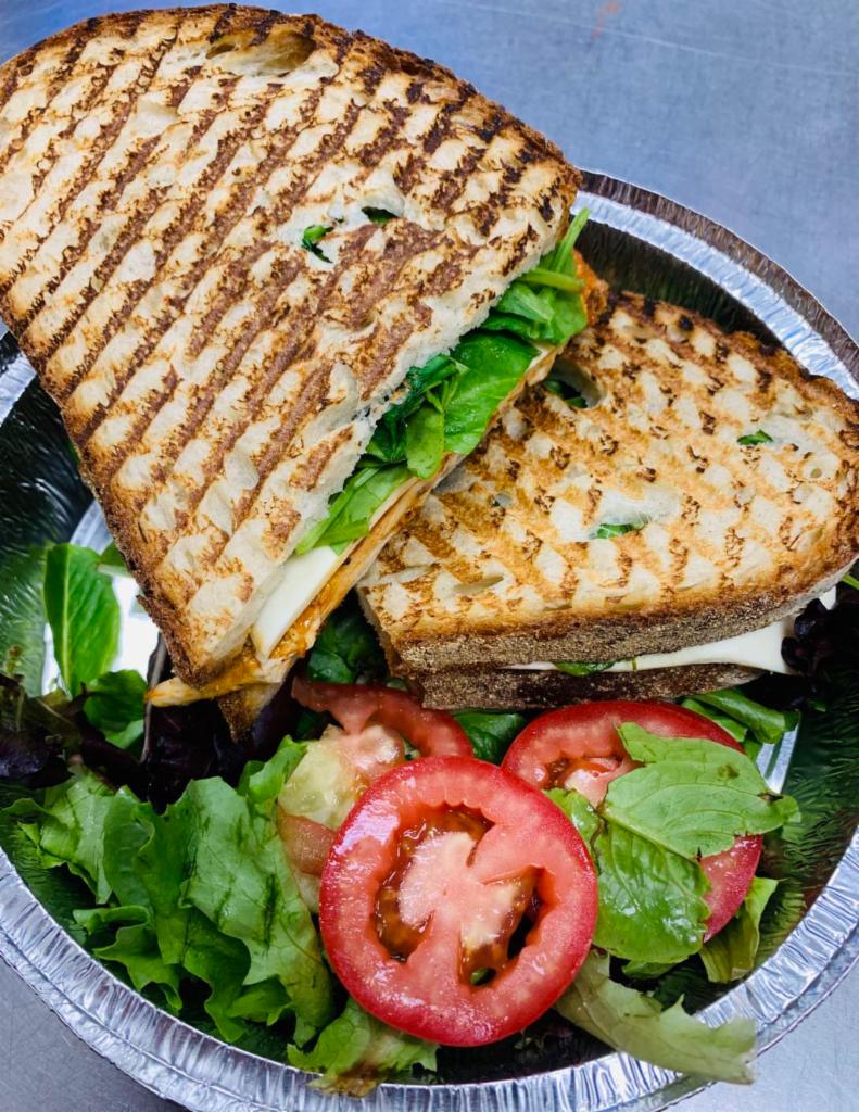 PS5. Domenica Panini · Thin sliced grilled chicken, roasted peppers, burrata cheese, baby spinach, red onion, extra virgin olive oil and balsamic vinaigrette or glaze.
