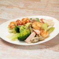 S3. Seafood Combination · Lobster meat, jumbo shrimp, crab meat and scallons mixed with vegetables.