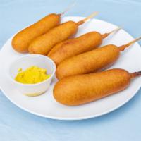 Corn Dogs · Battered and deep fried sausage on a stick. 