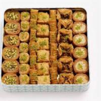 Baklava Bites · Various layered pastry dessert made of filo pastry, filled with chopped nuts, and sweetened ...