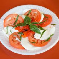7. Caprese · Fresh mozzarella cheese, sliced tomatoes, fresh basil, roasted sweet peppers and vinaigrette. 
