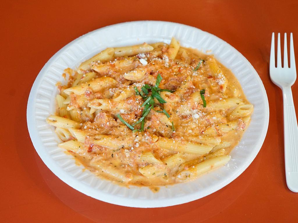 34. Alla Vodka with Pasta · Onions and vodka, in a pink sauce. Served with suggested penne or your choice of pasta. 