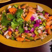 Kachumber Salad · Cucumbers, tomatoes, carrots, chickpeas served with a house dressing