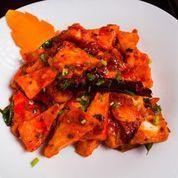 Paneer 65 · Fried paneer coated with rice flour and sauteed with red chili-yogurt, curry leaves, and dri...