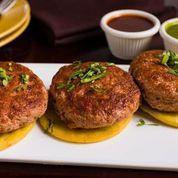 Galouti Kebab · Tender lamb patties, shallow fried, served with house biscuits and chutneys