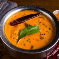 Malabar Murgh Curry · Chicken with curry leaves, red chili, mustard seed in creamy white sauce.