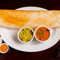 Masala Dosa · Thin rice crepe filled with mashed potatoes and onions