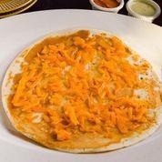 Cheese Uttapam · Rice and lentil pancakes with cheese
