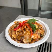 Pad Kee Mau (Drunken Noodles Spicy Hobo Noodle) · Broad rice noodles, onion, bell peppers, string beans and mushrooms. Spicy.