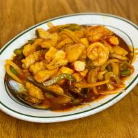 Mariscos Enchilado · Seafood with hot sauce. Fish, shrimp, scallops, calamari, mussels, served with white rice.