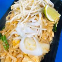 Pad Thai (FUSION) · Rice noodles stir-fried with choice of meat, egg, green onions, young coconut, bean sprouts,...