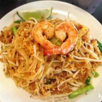 Pad Tom Yum · Stir fried rice noodles, egg, green onions, basil, and bean sprout in tom yum sauce. 