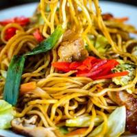 Kee Mao Yakisoba · Egg noodles stir fried with egg, onions, bell peppers, basil, chili, and garlic top with bea...