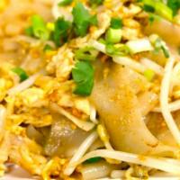 Gai Kua · Wide rice noodles stir fried with eggs, black pepper, green onions, bean sprouts in garlic s...