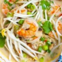 Coconut Noodles Soup · Rice noodles in spicy coconut milk soup with ground chicken, bean sprouts, basil, cracked pe...