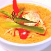 Red Curry · Red curry with, eggplants, bamboo shoots, bell peppers, coconut milk, and basil leaves. 