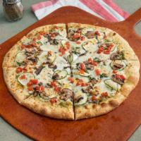 Pesto Supreme Pizza · Spinach, zucchini, fresh mushrooms, Roma tomatoes, feta and on a pesto base sauce.