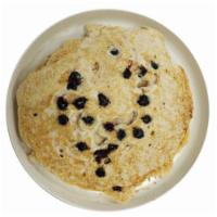 Vanilla Protein Whole Wheat Pancakes · Topped with blueberries. 