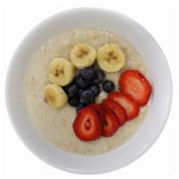 Organic Oatmeal  · Served with fruits (bananas, strawberries and blueberries.