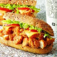 7. Chicken Parmigiana Sandwich · Chicken cutlet, melted mozzarella, marinara sauce on toasted hero.