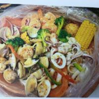 seafood boil bag combo#30 · 1 lb white clams, 1/2 Jumbo shrimps(cleaned, peeled ) and squid seasoned with butter garlic ...