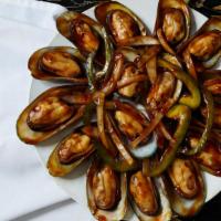 70. Mussels with Special Sauce · Mejillones.
