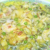 65. Seafood with Yellow Rice · Paella de mariscos.