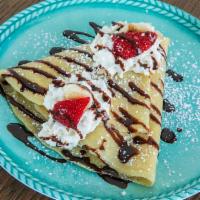 Option 1 Crepe · -Crepe, Nutella, bananas, strawberries, powdered sugar, whipped cream, and chocolate syrup.