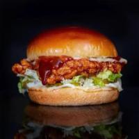 BBQ Fried Chicken Sandwich · Crispy and crunchy fried chicken sandwich. Served with BBQ sauce, lettuce, tomatoes and Amer...