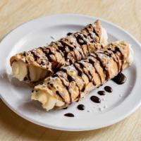 Cannoli · Italian pastry shell filled with sweetened ricotta cheese and chocolate bits.

