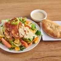 Grilled Chicken Caesar Salad · Romaine lettuce, croutons, onions, tomato, cucumber and chicken.  
