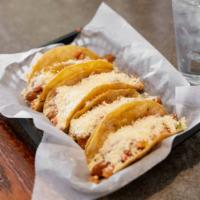 Chicken tacos · 4 Corn or flour tortilla with chicken taco meat, lettuce, tomatoes and queso fresco. Comes w...