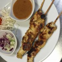 1. Chicken Satay · Grilled aromatic chicken fillets on skewers served with peanut sauce & cucumber salad.