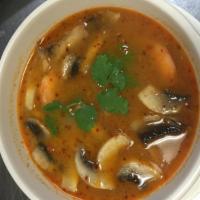 18. Shrimp Lemongrass Soup · Authentic hot spicy and sour shrimp with Thai herbs.