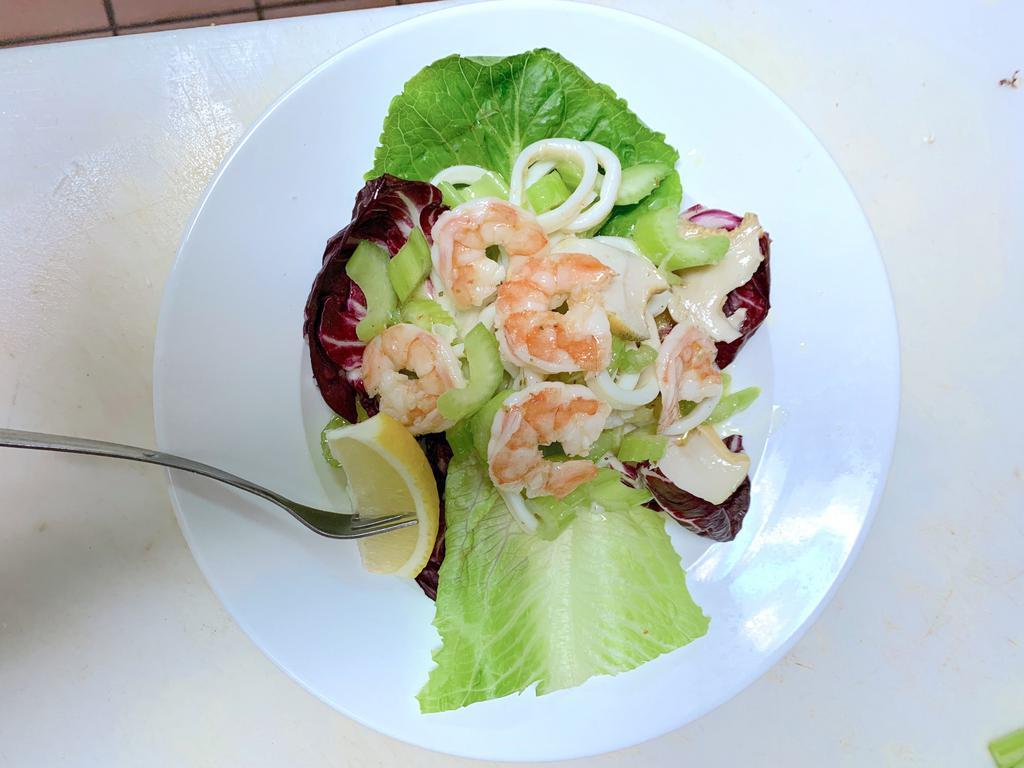 Seafood Salad Dinner · Served with lemon infused extra virgin olive oil.