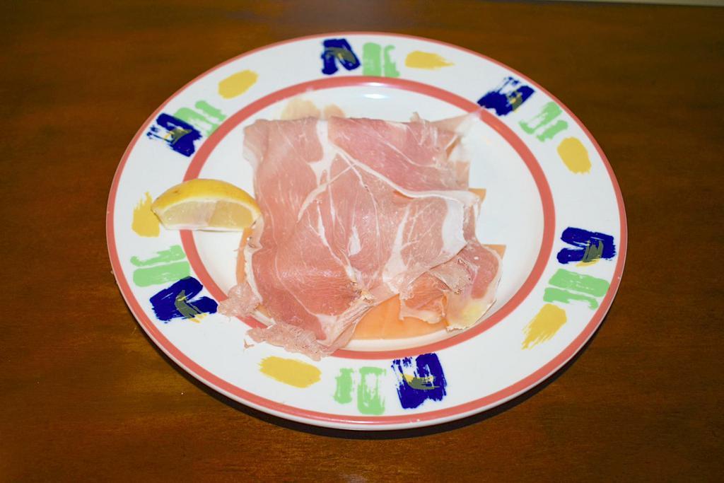 Prosciutto e Melone · Imported Parma Prosciutto,  fresh melon