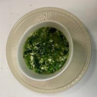 Stracciatella di Spinaci Soup · Homemade chicken broth, spinach and Parmesan cheese. Gluten free.
