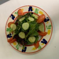 Insalata Mista · Mixed greens with tomatoes, cucumbers and balsamic vinaigrette. Gluten free, vegetarian and ...