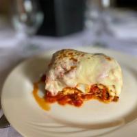 Antonio's Lasagna · Handmade lasagna with ricotta cheese and meat sauce.