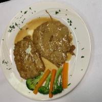 Veal Francese · Lightly battered veal scaloppini sauteed in lemon, butter and white wine sauce.