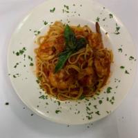 Shrimp Fra Diavolo · Shrimp sauteed in a spicy red sauce over linguine. Gluten free penne available.